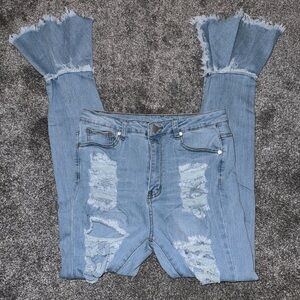 Light wash ripped skinny jeans flare bottom
